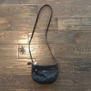Crossbody black coach bag.